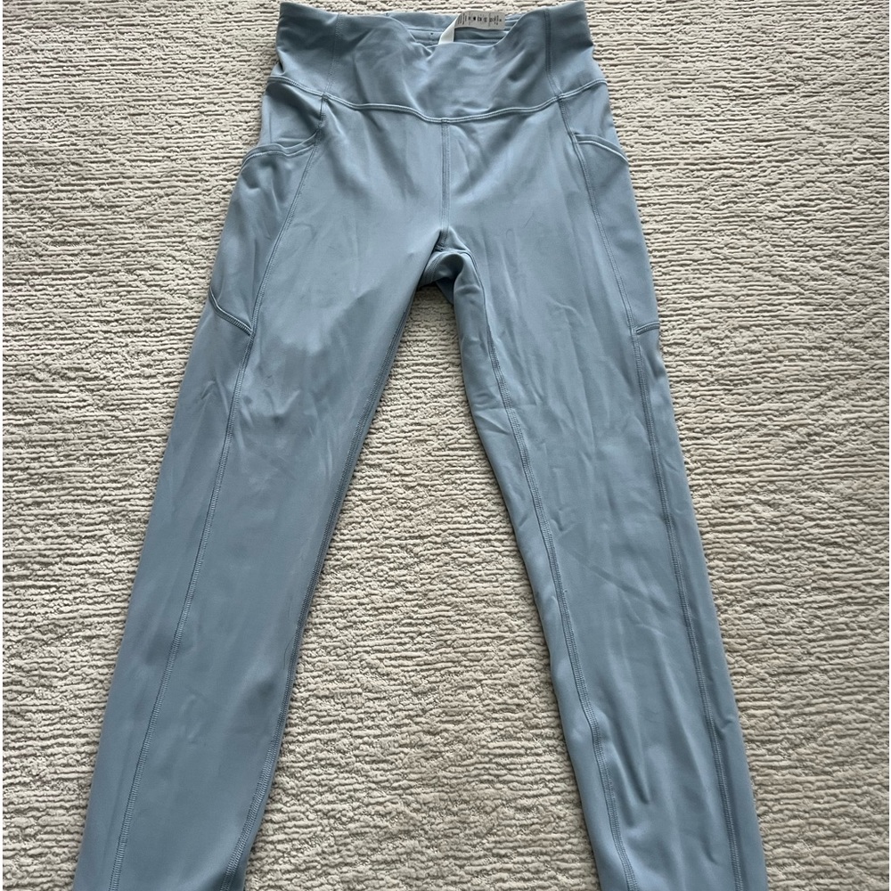 Size 6, like new, well fitted, athletic